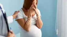 أعراض اكتئاب الحمل وأسبابه وطرق علاجه