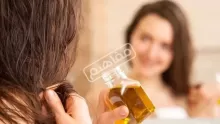 ما هو افضل زيت لتنعيم الشعر المجعد والجاف؟